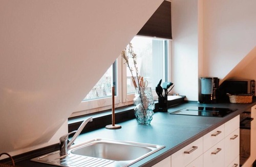 Neuharlingersiel Appartement | Apartment KÖÖK IV Küstentraum - modern, balcony, close to the beach, maisonette
