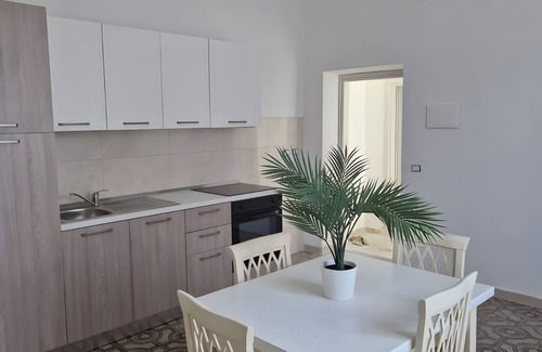 Capaccio Scalo Appartement | Apartment 'L'Orchidea' with Private Garden, Wi-Fi and Air Conditioning