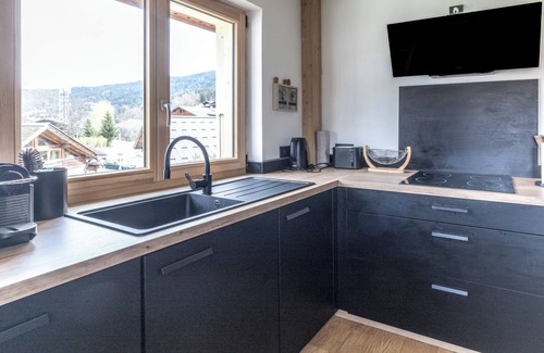 Les Carroz-d'Araches Appartement | Appartement 'Le Chappart - Carroz D'Arâches' avec vue sur les montagnes, terrasse privée et Wi-Fi