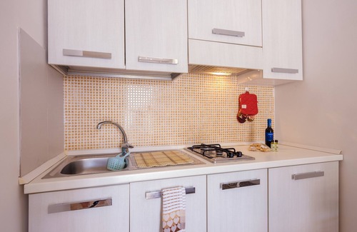 Borgagne Appartement | Appartement 'Mamba House 1' avec terrasse privée, jardin partagé et climatisation