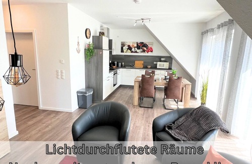 Papenburg Appartement | Apartment "Neptun" Papenburg 2SZ EBK Modern bathroom Large roof terrace New building WLAN