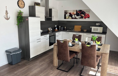 Papenburg Appartement | Apartment "Neptun" Papenburg 2SZ EBK Modern bathroom Large roof terrace New building WLAN