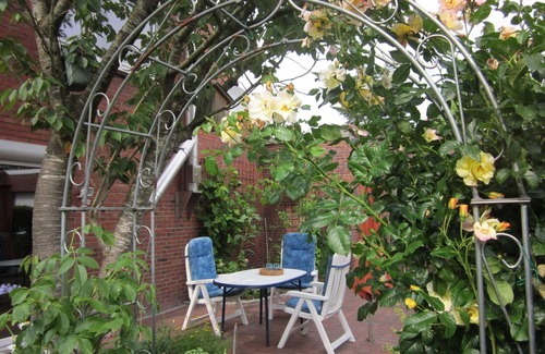Norddeich Appartement | Appartement à l'étage supérieur dans un endroit calme avec jardin