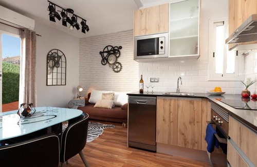 El Guinardo Appartement | Appartement 'Penthouse Girasol' avec terrasse privée, Wi-Fi et climatisation.
