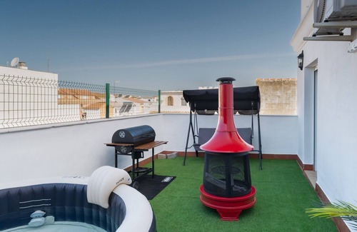 Pilas Appartement | Appartement 'Pilas' avec piscine partagée, Wi-Fi et climatisation