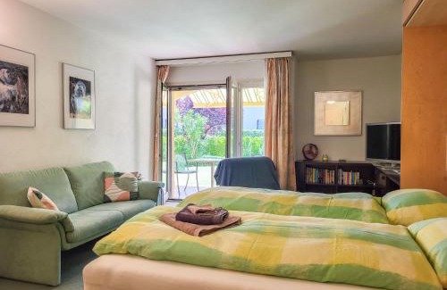 Caslano Appartement | Apartment Residenza Parcolago Apt 018 mit Garten by Interhome
