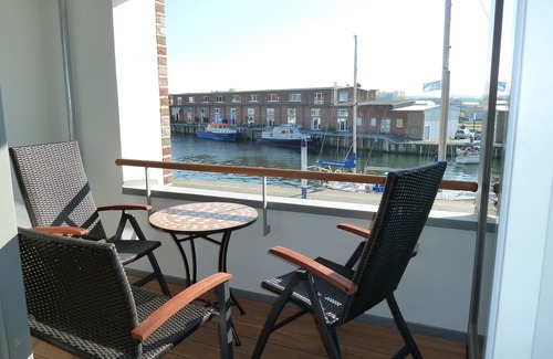 Wismar Appartement | Appartement "Schnieke Hüsing" dans un emplacement privilégié directement sur le vieux port de Wismar