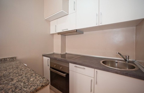 Santa Eulalia del Rio Appartement | Appartement Ses Veles 2 dormitorios près de la plage avec vue sur mer, piscine, Wi-Fi et jardin
