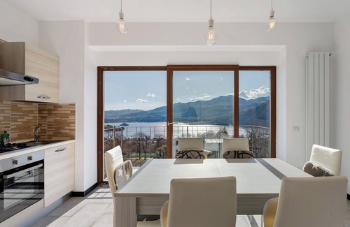 Pratolungo Appartement | Appartement "Sole" avec vue sur le lac, piscine partagée et Wi-Fi