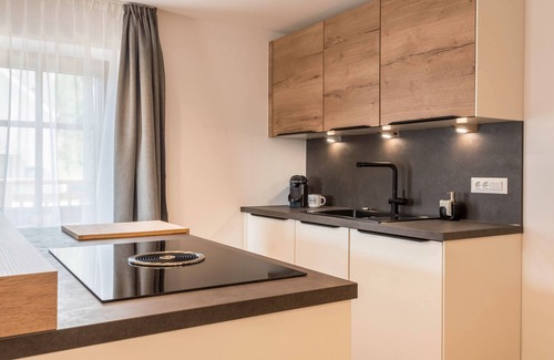 Campo di Trens Appartement | Appartement 'Sparberhof - Floriani' avec vue sur les montagnes, terrasse plein air et Wi-Fi.