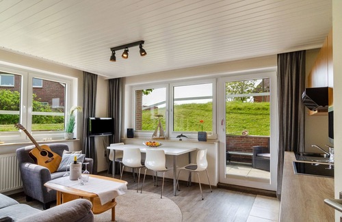 Baltrum Appartement | Appartement "Hus Uiterst-Hörn Backbord" avec vue sur mer, jardin et Wi-Fi.