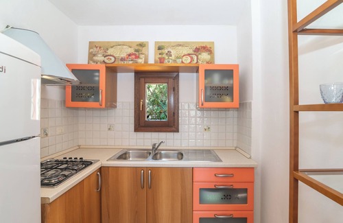 Porto San Paolo Appartement | Appartement 'Tavolara Porto San Paolo E2' avec vue sur la mer, piscine partagée et climatisation