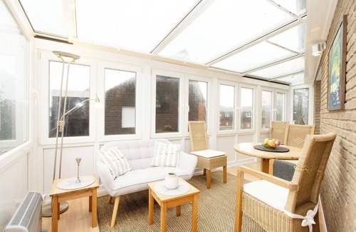 Langeoog Appartement | Apartment "Thomas" with light-flooded winter garden on the eastern edge of Langeoog village