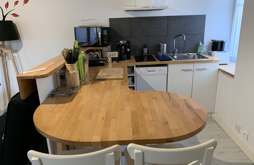 Arbois Appartement | Charmant gite avec jardin et parking dans maison vigneronne.