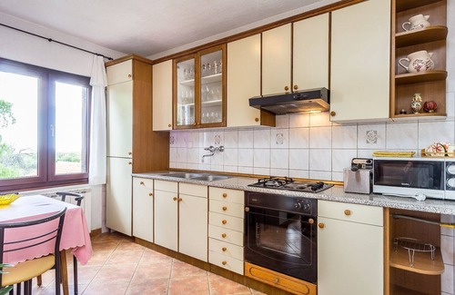 Gajana Appartement | Appartement avec grand jardin pour jouer au football