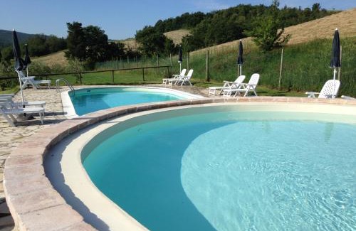 Chianni Maison | Apartment with one bedroom, kitchen, bathroom Garden and shared pool