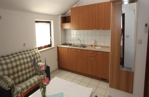 Cres Appartement | Appartement avec deux chambres et terrasse lit double
