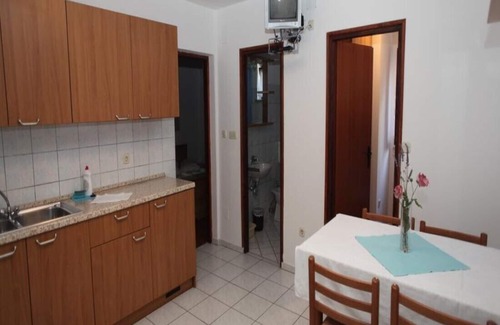 Cres Appartement | Appartement avec deux chambres et terrasse lit double