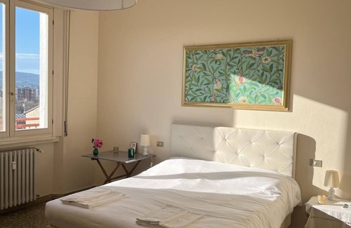 Isolotto Lit Et Petit-Déjeuner | Apartment with two spacious rooms, a bathroom and a kitchen with a balcony.