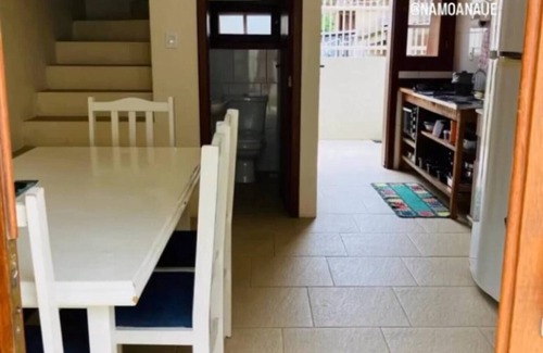Barra de Ibiraquera Appartement | Apartment with two suites, two blocks from the sea and three from the lagoon.
