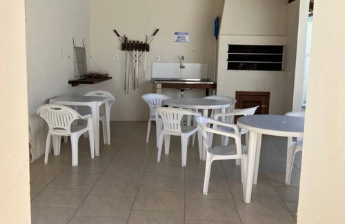 Barra de Ibiraquera Appartement | Apartment with two suites, two blocks from the sea and three from the lagoon.
