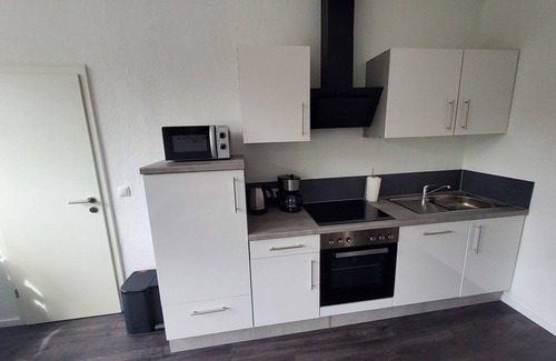 Veldhausen Appartement | Appartement "Wohnung 1" avec terrasse partagée et Wi-Fi