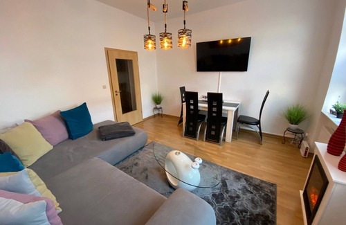 Mitte Appartement | Apartment Zur Schleuse with fireplace, garden, family-friendly.