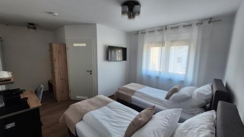 Sondelfingen Maison | Apartments Seibel Doppel-Zweibettzimmer mit Bad