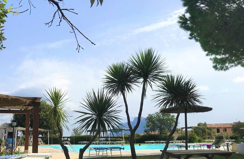 Porto San Paolo Appartement | Appartamento a Pochi Passi dal Mare con Patio e Giardino Privato