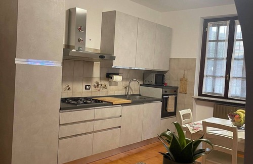 Oleggio Appartement | Appartamento in Oleggio with pool view and garden. Carpe diem and dont lose ti