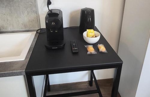 Saint-Claude Appartement | Appartement 2 Coin cuisine, coin chambre, salle de bain