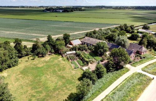 Baflo Lit Et Petit-Déjeuner | Appartement 3 met terras aan de tuin van Op de Roemte