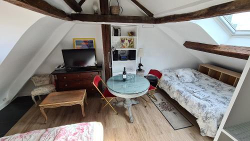 Quartier de la Place-Vendome Appartement | Appartement Cœur de Paris avec vue sur les toits
