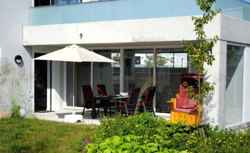 Lohme Appartement | Appartement Kranich - Moderne Ferienwohnung direkt am Schloss Ranzow!