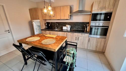Maisieres Appartement | Appartement proche Pairi Daiza 6pers terrasse et jardin