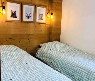 Genos Appartement | Appartement T4 8 couchages spacieux et cosy au pied des pistes