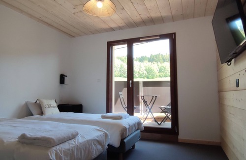Les Hopitaux-Neufs Hôtel | Appart-Hôtel en Montagne : Piscine, Sauna et Confort pour Toute la Famille