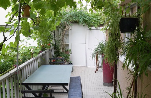 Batignolles Appartement | Appt + terrasse sur jardin 4 personnes face métro et parc Luther king