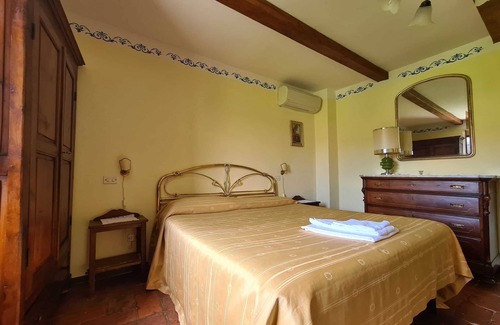 Camucia Appartement | Appart. climatisé près de Cortona, piscine, jardin & belles vues sur la campagne