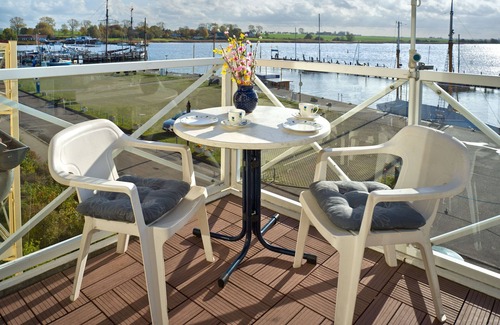 Oertzenhof Appartement | Apt. MÖWENBLICK - Direct view of the beautiful harbor (Kirchsee) of Kirchdorf.