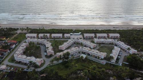 Aritagua Appartement | Apto em condomínio na praia, com terraço, em Ilhéus-BA