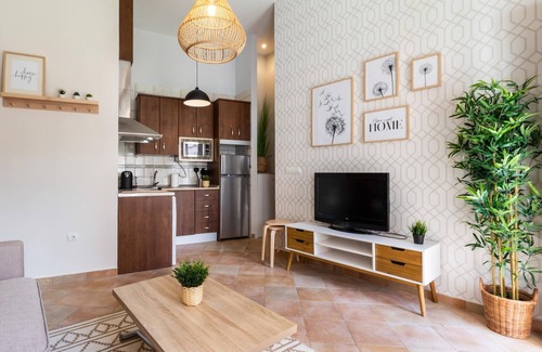 San Ildefonso Appartement | Apto Real Bajo Cartuja. Appartement avec patio privé et Wi-Fi.