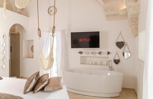 Savelletri Lit Et Petit-Déjeuner | Apulia Charming Suites - Suite Corallo con vista mare e hot Jacuzzi