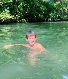 Sutherland Springs Autre | Aquatic Retreat: Waterfront Tented Cabin with Full Amenities for Water Lovers in Cibolo, TX