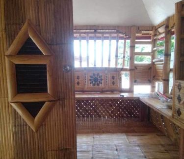 San Juan Lit Et Petit-Déjeuner | Aremen Transient, Nipa Hut with shared main houses bathroom