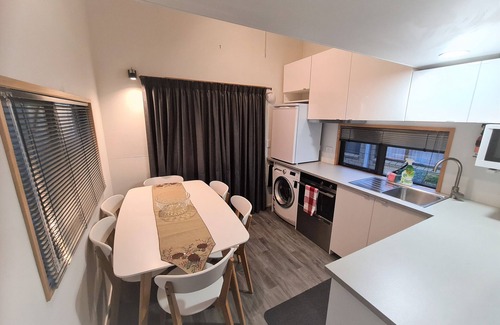 Pukehangi Maison | Arias Farmlet Tiny Home - quiet bungalow with breakfast, spa, animals to feed