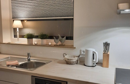 Annweiler am Trifels Copropriété | Arrive and feel at home! First floor apartment with a view of the garden paradise