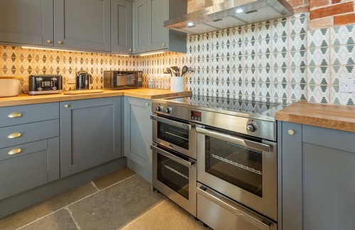 Thetford Appartement | Au Bodney Lodge, vous pouvez séjourner au cœur de la campagne préservée des Brecklands de Norfolk