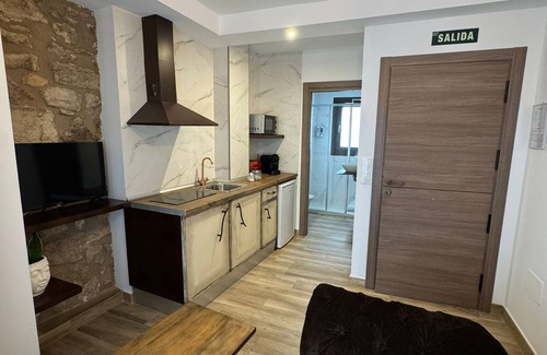 Old Town Appartement | ATENEO CUENCA, BOUTIQUE SUITES, with kitchen in the historic center.