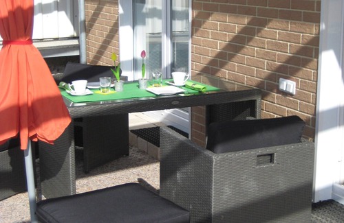 Brakel Maison | Maison de vacances atrium dans le vert pour "deux", pignon en verre, terrasse en verre, Weserbergland